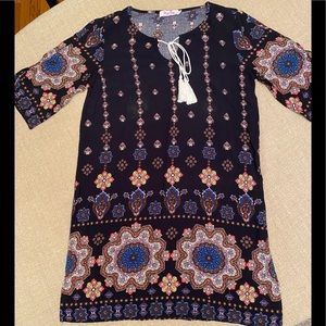 Casual medium sized dress.						95% polyester 5% spandex